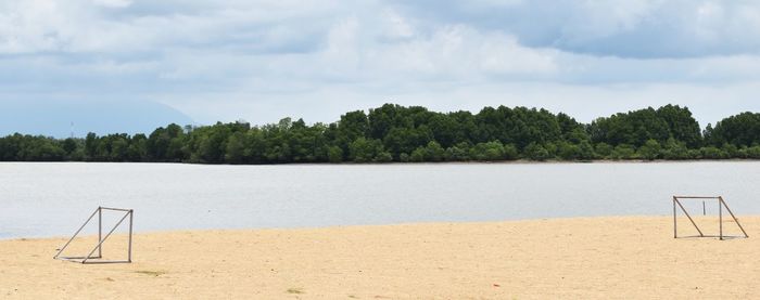 Scenic view of beach against sky