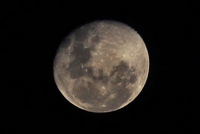 Close-up of moon against clear sky at night