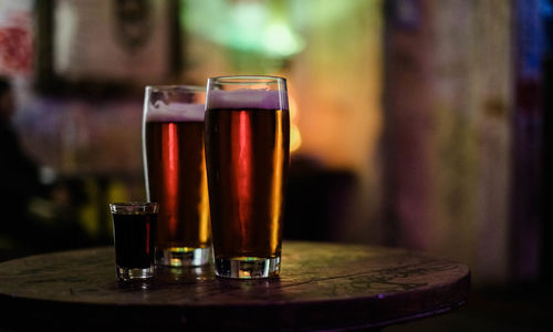 Close-up of beer glass on table