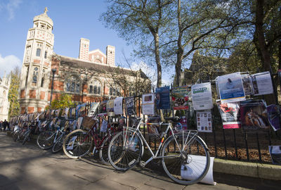 Bicycles against sky in city