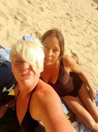 Portrait of smiling woman on beach