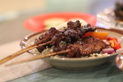 Close-up of food in plate on table