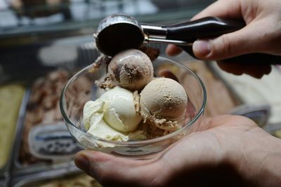 Hand holding ice cream