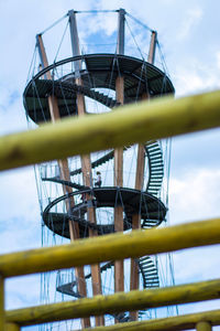 Low angle view of metallic structure against sky