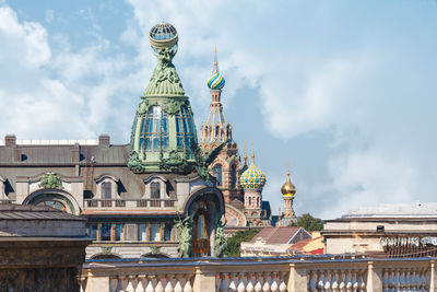 Aerial photo of domes of the singer house and domes of the cathedral of the savior on spilled blood