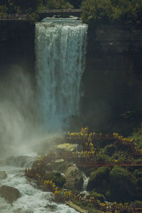 Scenic view of waterfall at seaside