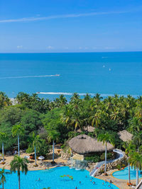 Scenic view of sea against blue sky