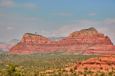 View of rock formations against sky