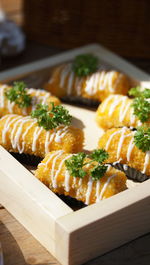 Close-up of sushi served on table