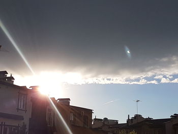 Low angle view of vapor trails in sky