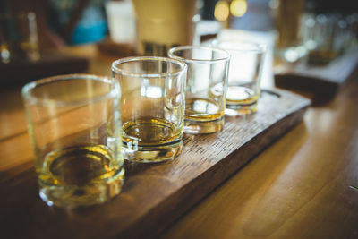 Close-up of glasses on table