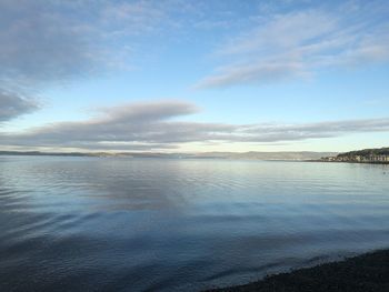 Scenic view of sea against sky at sunset