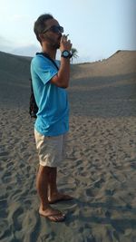 Full length of boy on beach