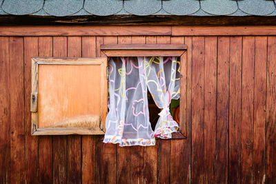 Close-up of clothes hanging on wall