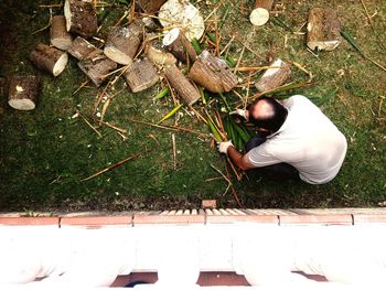 Man is collecting firewood