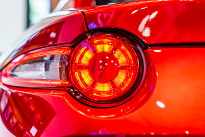 Close-up of red vintage car