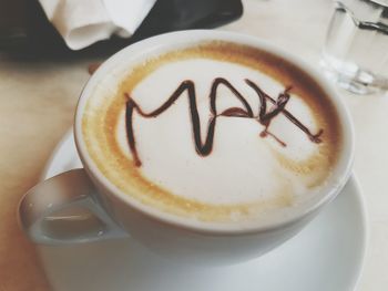 Close-up of coffee cup on table