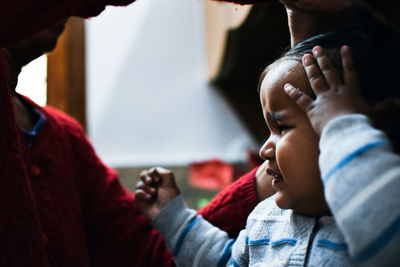 Close-up of woman and baby