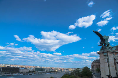 Built structure against cloudy sky