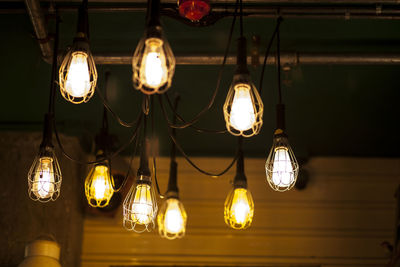 Low angle view of illuminated light bulb