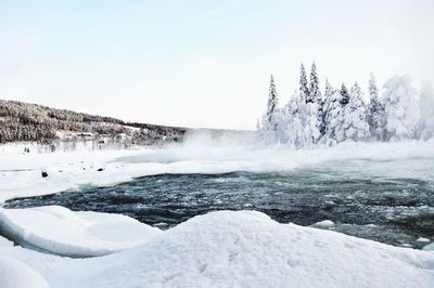 Scenic view of snow covered landscape