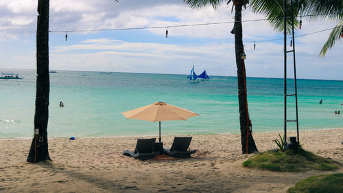 Scenic view of beach against sky