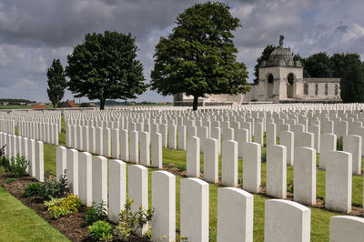 View of cemetery against cloudy sky