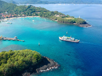 High angle view of ship sailing in sea