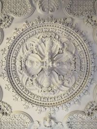 Directly below shot of ornate ceiling