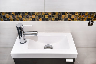 High angle view of faucet in bathroom