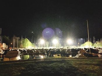 View of illuminated field at night