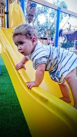 Portrait of cute girl playing in playground