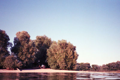 Scenic view of lake against clear sky