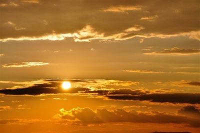 Scenic view of dramatic sky during sunset