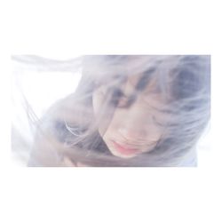 Double exposure of young woman