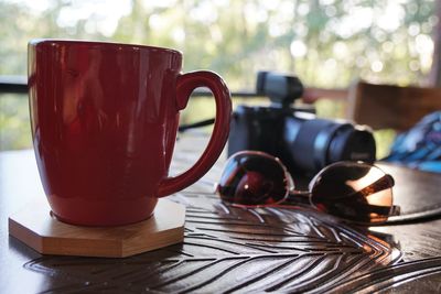 Close-up of coffee cup on table