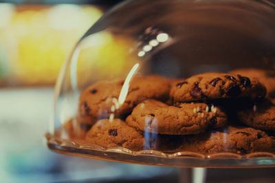 Close-up of cookies in glass on table