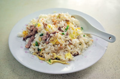 Close-up of rice served on table