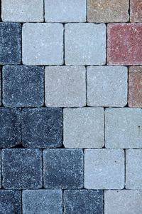 Directly above view of paving stone footpath