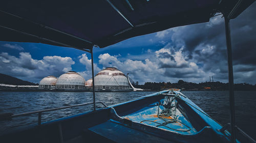 Boats in sea against sky