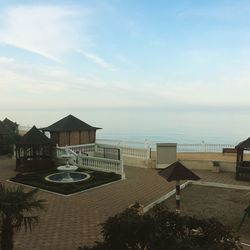 Built structure on beach against sky