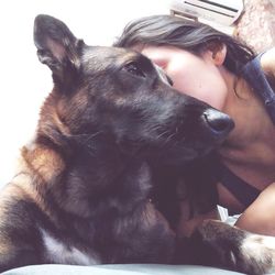 Close-up portrait of woman with dog