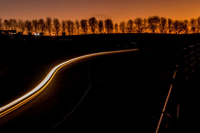 Scenic view of silhouette trees against sky during sunset