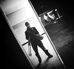 Boy playing in corridor