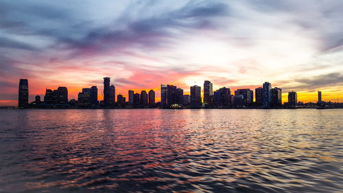 City lit up at sunset