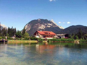 Scenic view of lake against sky