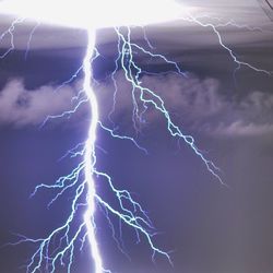 Low angle view of lightning against sky