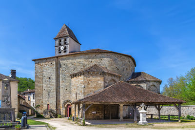 Low angle view of church against blue sky