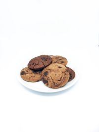 Close-up of cookies against white background