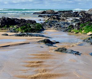 Scenic view of beach against sky